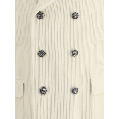 Detailed view of Brunello Cucinelli Cream Cashmere Coat, featuring ribbed texture and elegant metal button closure.