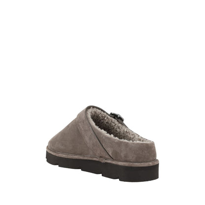 Brunello Cucinelli Gray Calf Leather Bos Taurus Clogs with fur trim, knurled sole, and adjustable buckle detail for style and comfort.