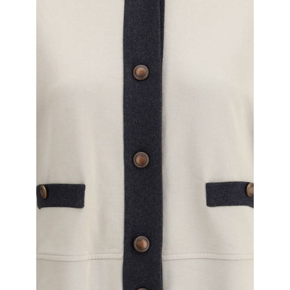 Close-up of Brunello Cucinelli Gray Cotton Cardigan with button closures and welt pockets.