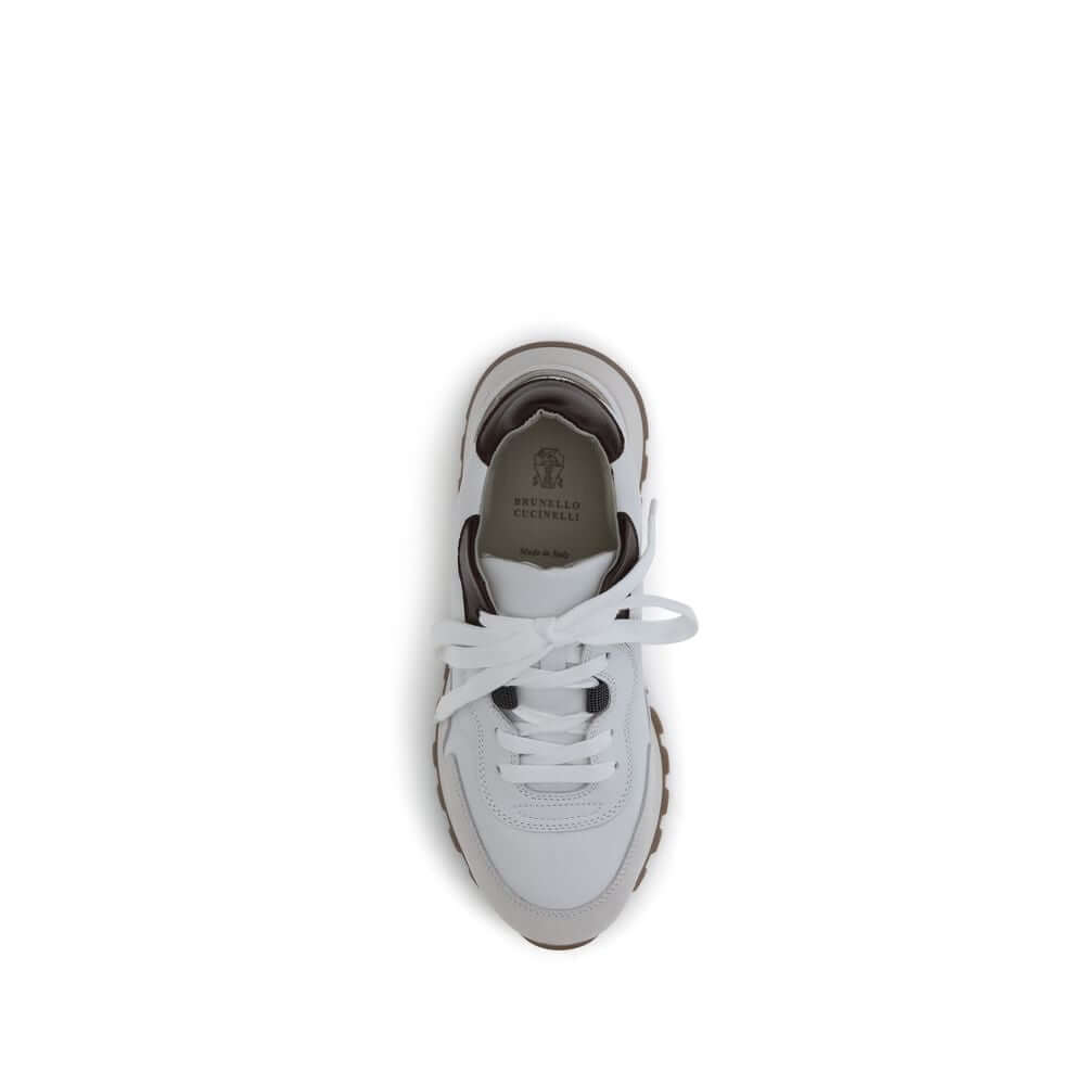 Top view of Brunello Cucinelli White Leather Athletic Sneakers with shiny jewel detail and flat cotton laces.