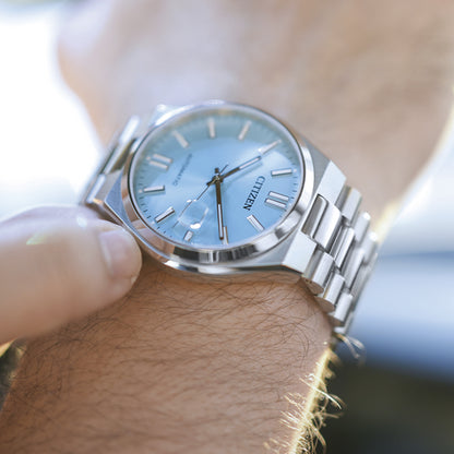 Gent's CITIZEN MOD. NJ0151-88M wristwatch with stainless steel bracelet and sapphire dial, shown on wrist, water resistant 5 ATM.