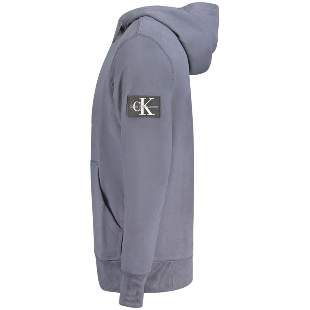 Calvin Klein Blue Cotton Men Sweater with hood and central pocket, showcasing the iconic CK logo patch and made of regenerative cotton.