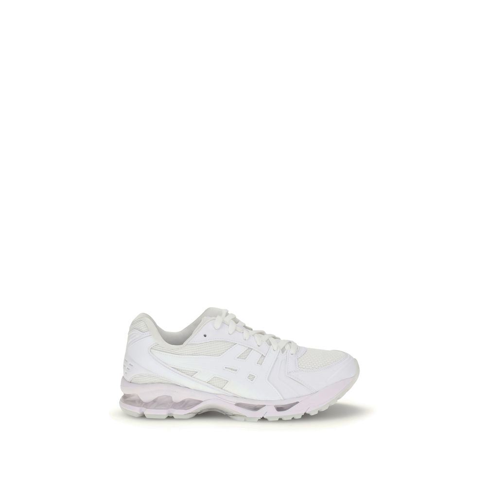 Comme Des Garçons White Polyamide Athletic Sneakers with lace-up design, shown in side profile on a white background.