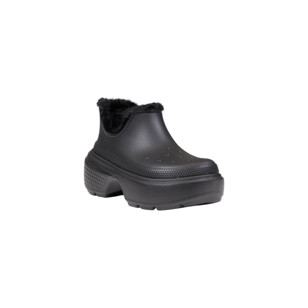 Crocs Black Croslite Ankle boot showcasing lightweight comfort and warm lining for casual walks and trendy looks.