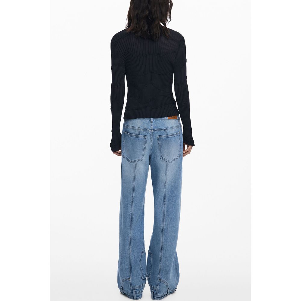 Rear view of model wearing Desigual Black Viscose Women Cardigan with jeans, showcasing the cardigan's design and fit.