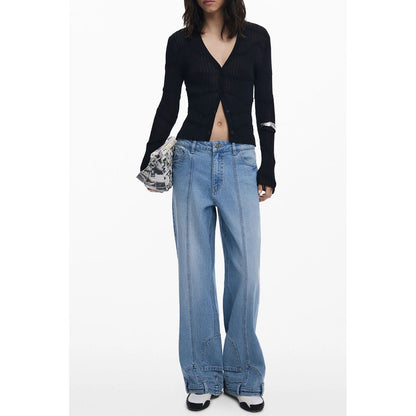 Model wearing Desigual Black Viscose Women Cardigan with stylish jeans, showcasing chic fashion statement in casual attire.