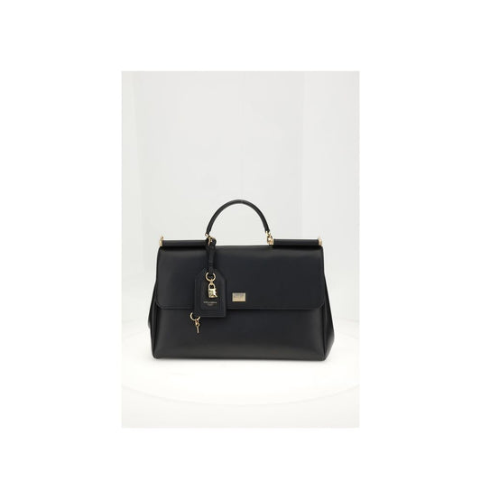 Dolce & Gabbana Black Calf Leather Bos Taurus Shoulder Bag with leather handles and vintage brass details.