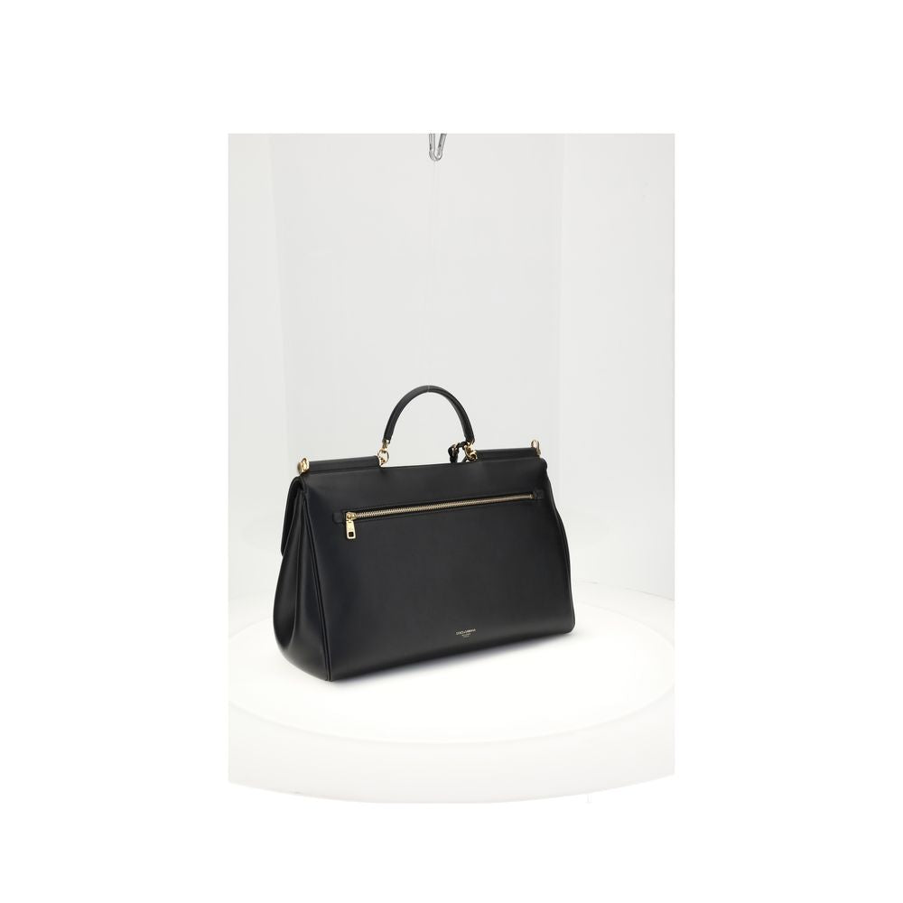 Dolce & Gabbana Black Calf Leather Bos Taurus Shoulder Bag with vintage brass details and adjustable strap.