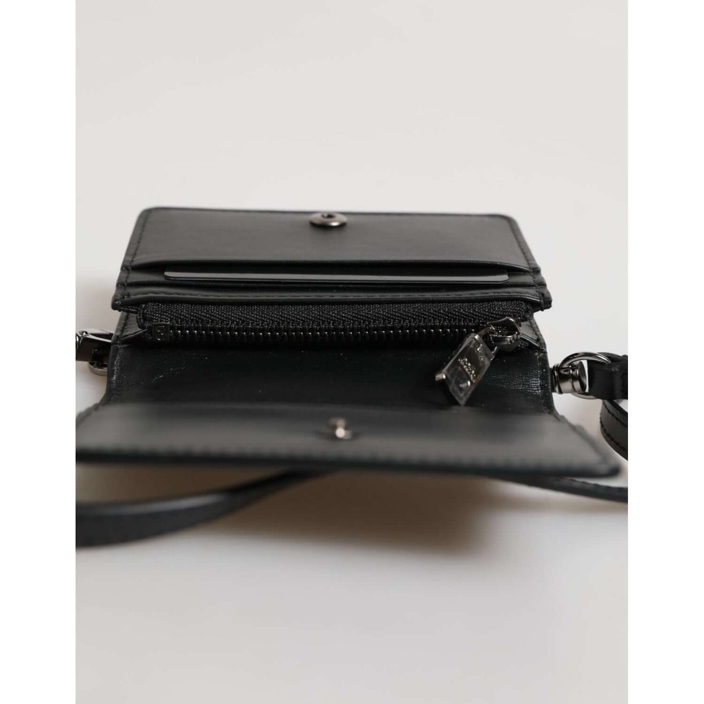 Dolce & Gabbana Black Leather Bifold Card Holder Crossbody Men Borse Bag, open view showing interior compartments and snap button closure.