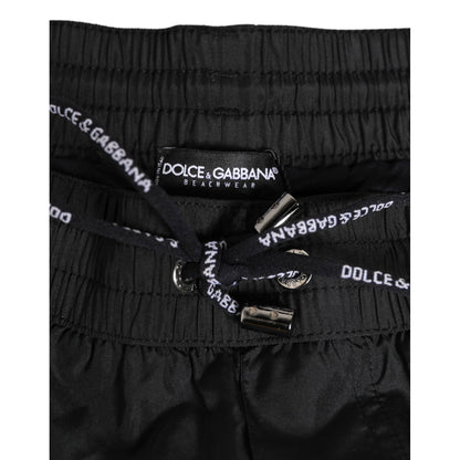 Close-up of Dolce & Gabbana Black Nylon KING Sideband Men Boxer Shorts Swimwear showing logo drawstring and elastic waistband.