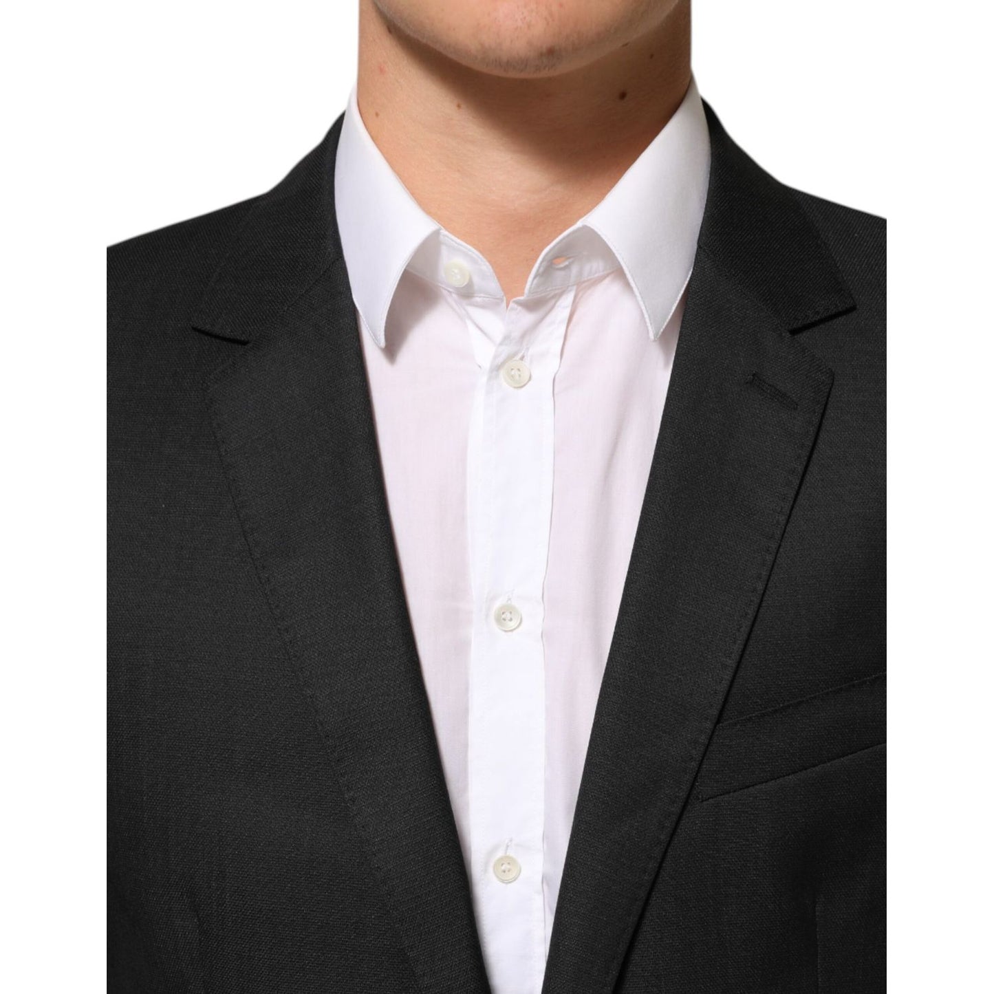 Dolce & Gabbana Black Single Breasted Men Coat MARTINI Blazer in virgin wool, close-up view of slim-fit design with white shirt.