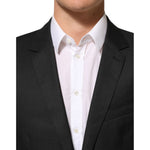 Dolce & Gabbana Black Single Breasted Men Coat MARTINI Blazer in virgin wool, close-up view of slim-fit design with white shirt.