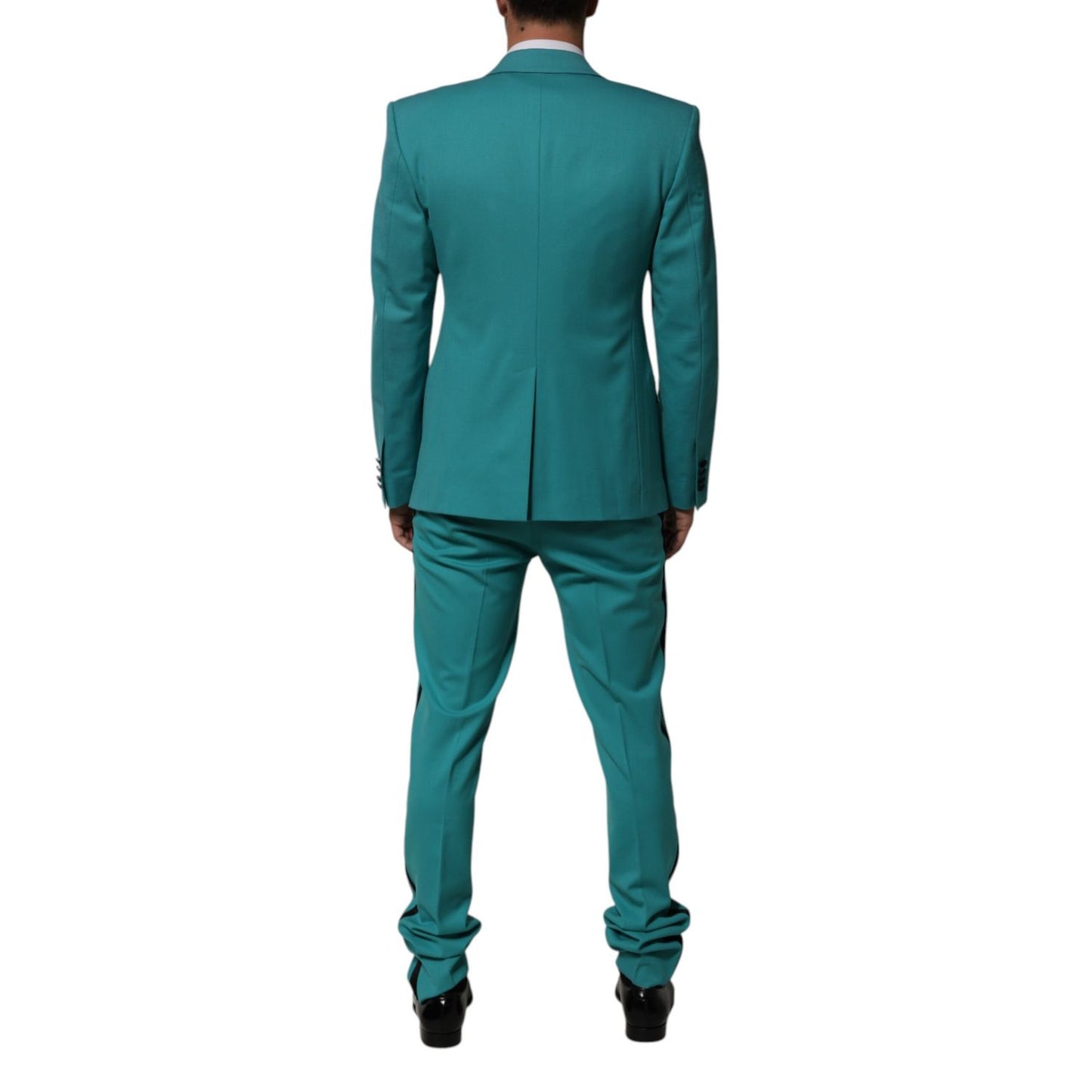 Back view of Dolce & Gabbana Cyan 3 Piece Wool Silk Blend Suit SICILIA with black satin lapels, showcasing sleek tailoring.