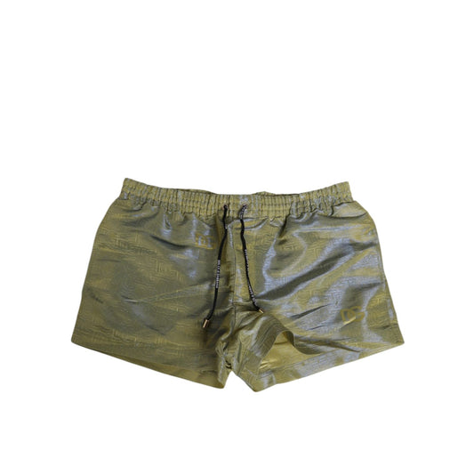 Dolce & Gabbana Green Polyester Metallic Logo Print Men Swimwear with elastic waist and drawstring closure.