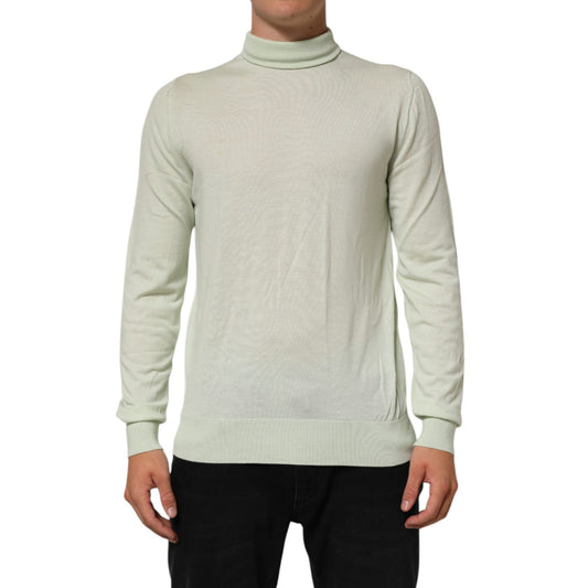 Dolce & Gabbana Light Green Logo TurtleNeck Pullover Sweater in 100% virgin wool with ribbed hem, perfect for layering in cooler weather.