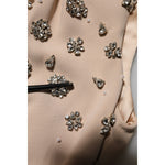 Close-up of Dolce & Gabbana Nude Ecru Beaded Crystal Embellished Dress, showcasing intricate crystal detailing and beadwork.