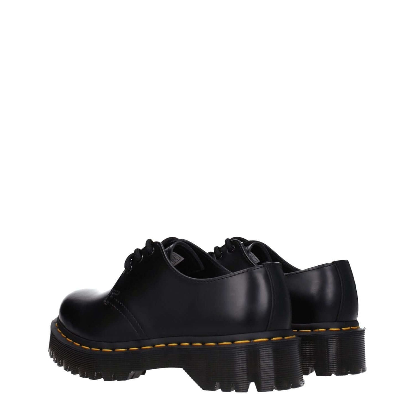 Dr. Martens Black Leather Oxfords And Derbies, lace-up shoes with rubber sole and mid heels, casual style for men and women.