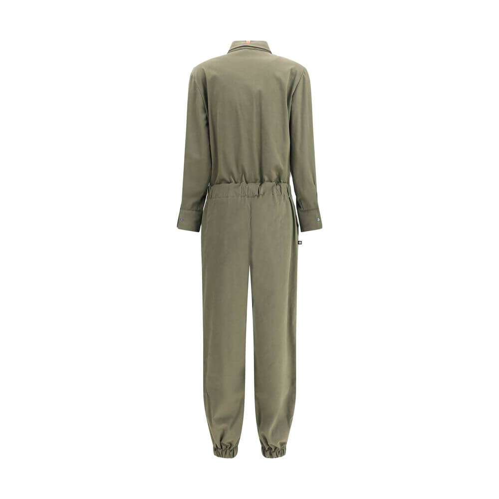 Back view of Ella Green Cotton Jumpsuit with a refined design, featuring elastic waistband and cuffs for a tailored fit.