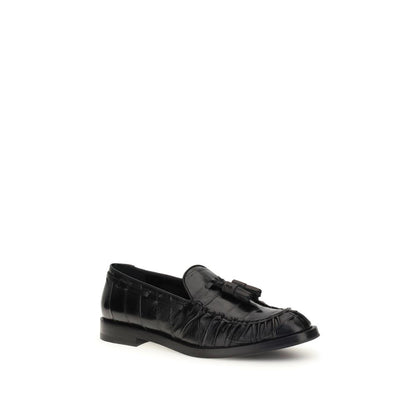 Fratelli Rossetti Black Rubber Slip-On Loafers with tassels, featuring a round toe and flat sole for a smart or casual elegant look.
