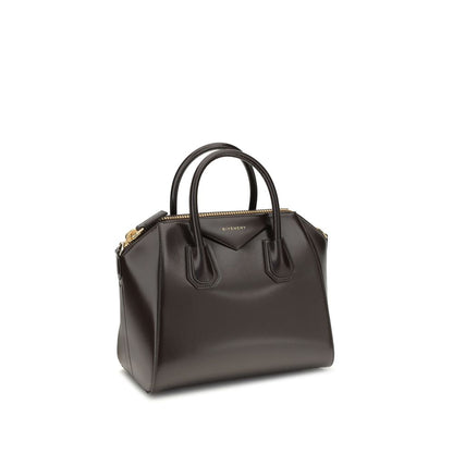 Givenchy Brown Calf Leather Bos Taurus Handbag with glossy finish, featuring round handles, zipper closure, and shoulder strap.