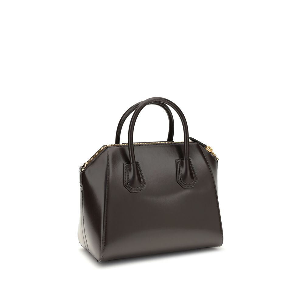 Givenchy Brown Calf Leather Bos Taurus Handbag with glossy finish and removable shoulder strap, featuring two round handles.