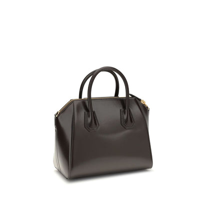 Givenchy Brown Calf Leather Bos Taurus Handbag with glossy finish and removable shoulder strap, featuring two round handles.