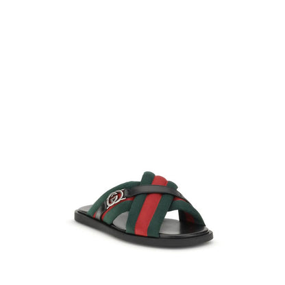 Gucci Black Polyamide Flat Sandals with iconic green and red Web fabric and Interlocking GG logo, elegant and refined design.