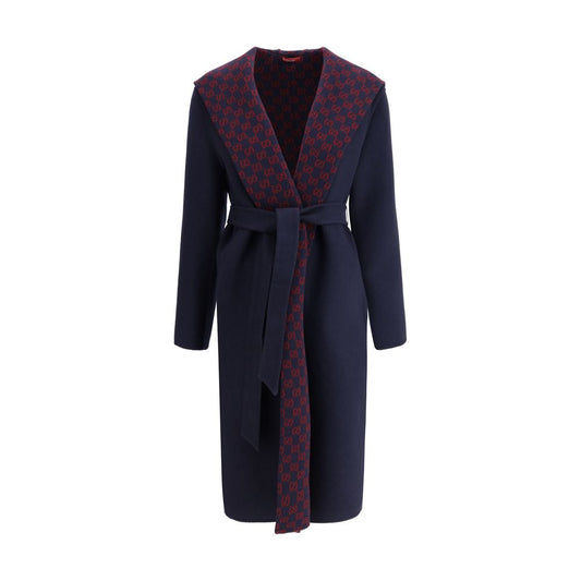 Gucci Blue Wool Coat with monogram hood and sash, elegant design, side welt pockets, and contrasting interior.