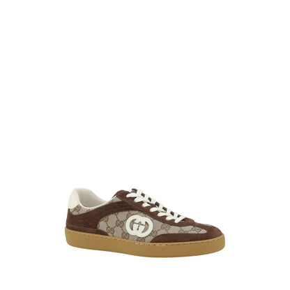 Gucci Brown Calf Leather Bos Taurus Low Top Sneakers with GG fabric, suede details, round toe, and lace-up front.