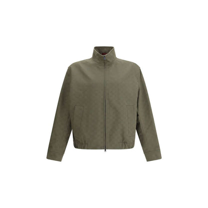 Gucci Green Cotton Bomber featuring GG Supreme design with high collar, zipper closure, side pockets, ribbed hem, AW25 collection.