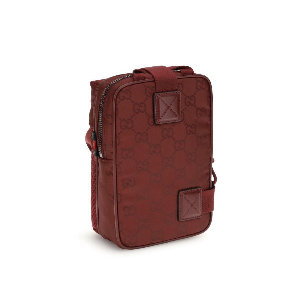 Front view with bag zipped and handles upright.