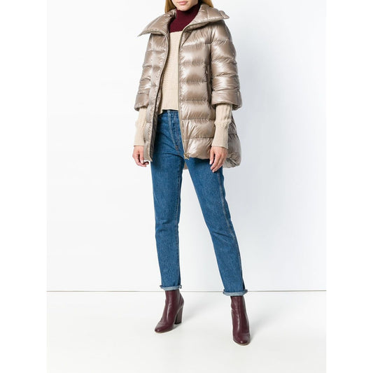 Woman wearing Herno Coats Dove Grey padded zipped coat.