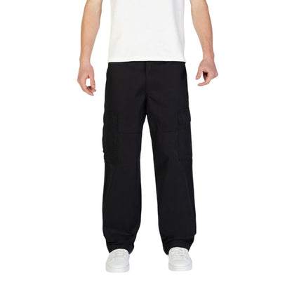 Person wearing Jack Jones Black Cotton Cargo Pants with side flap pockets and regular fit.