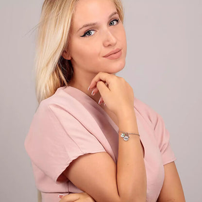 Woman wearing LA PETITE STORY JEWELRY Mod. LPS05ARR62 bracelet in stylish pose.