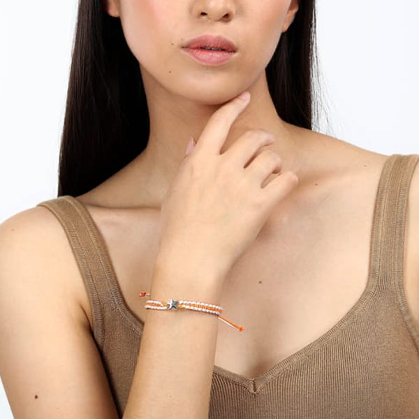 Woman wearing LA PETITE STORY JEWELRY Mod. LPS05ARR79 bracelet on wrist, featuring elegant and stylish design.