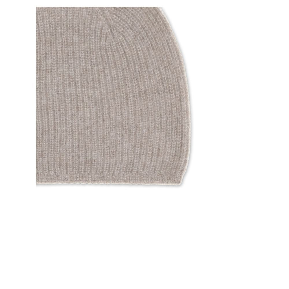 Loulou De Saison Beige Cashmere Beanie with ribbed texture, providing warmth and softness for stylish winter wear.