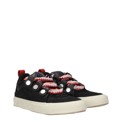 Marcelo Burlon Black Leather Low Top Sneakers with red accents and aged effect, featuring logo details and rubber sole.