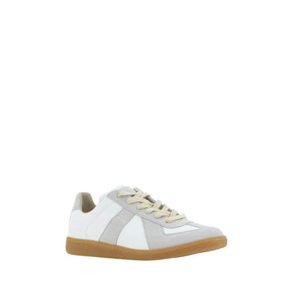 Margiela White Rubber Low Top Sneakers with suede detailing, gum sole, and lace-up closure.