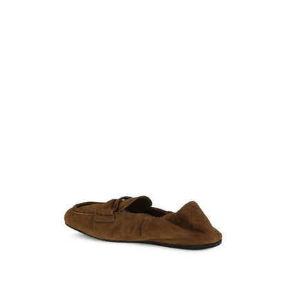 Miu Miu Brown Calf Leather Bos Taurus Slip-On Loafers with suede finish and leather horsebit, embossed logo on tongue.