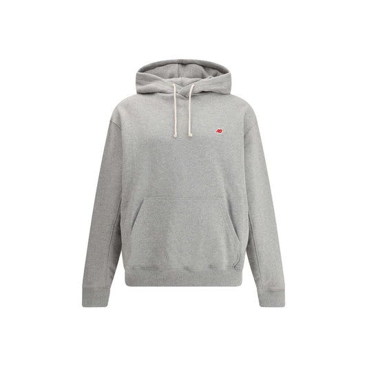 New Balance Gray Cotton Sweatshirt with double-lined hood, ribbed cuffs, and front logo, showcasing comfort and style.