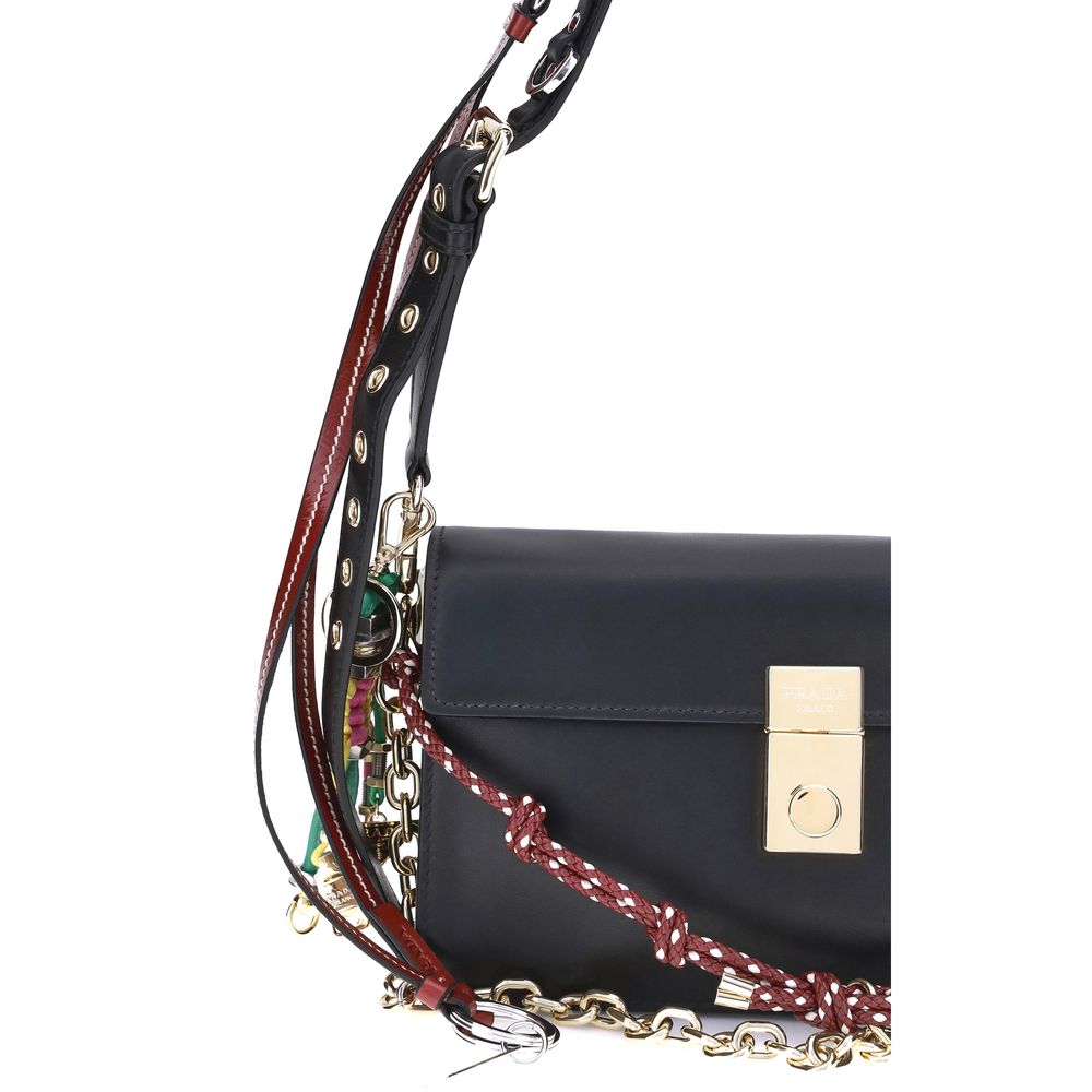 Prada Black Calf Leather Bos Taurus Shoulder Bag with metallic logo and decorative strap details.