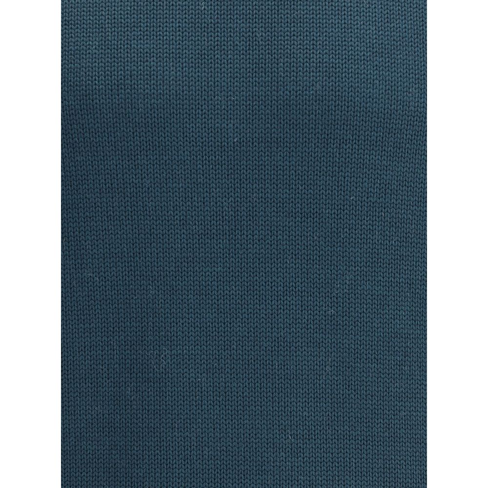 Close-up of Roberto Collina Green Merino Wool Turtleneck fabric showcasing ribbed texture.