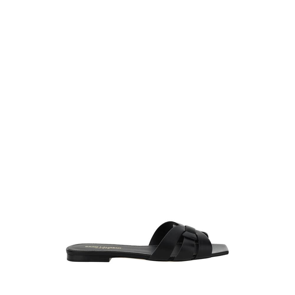Saint Laurent Black Calf Leather Bos Taurus Flat Sandals with iconic monogram, ankle strap, and logoed insole. Made in Italy.