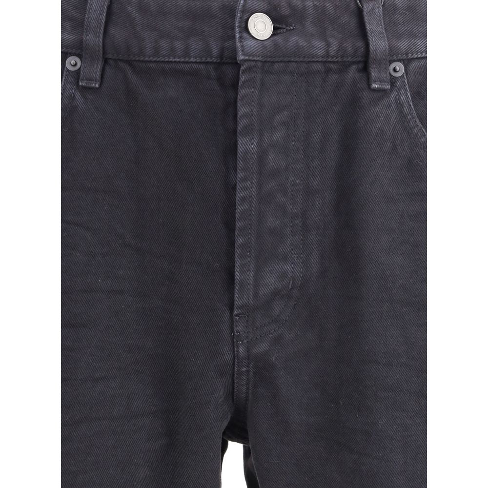 Close-up of Saint Laurent Black Cotton Straight-Leg Jeans with front zipper, button closure, and five-pocket design.