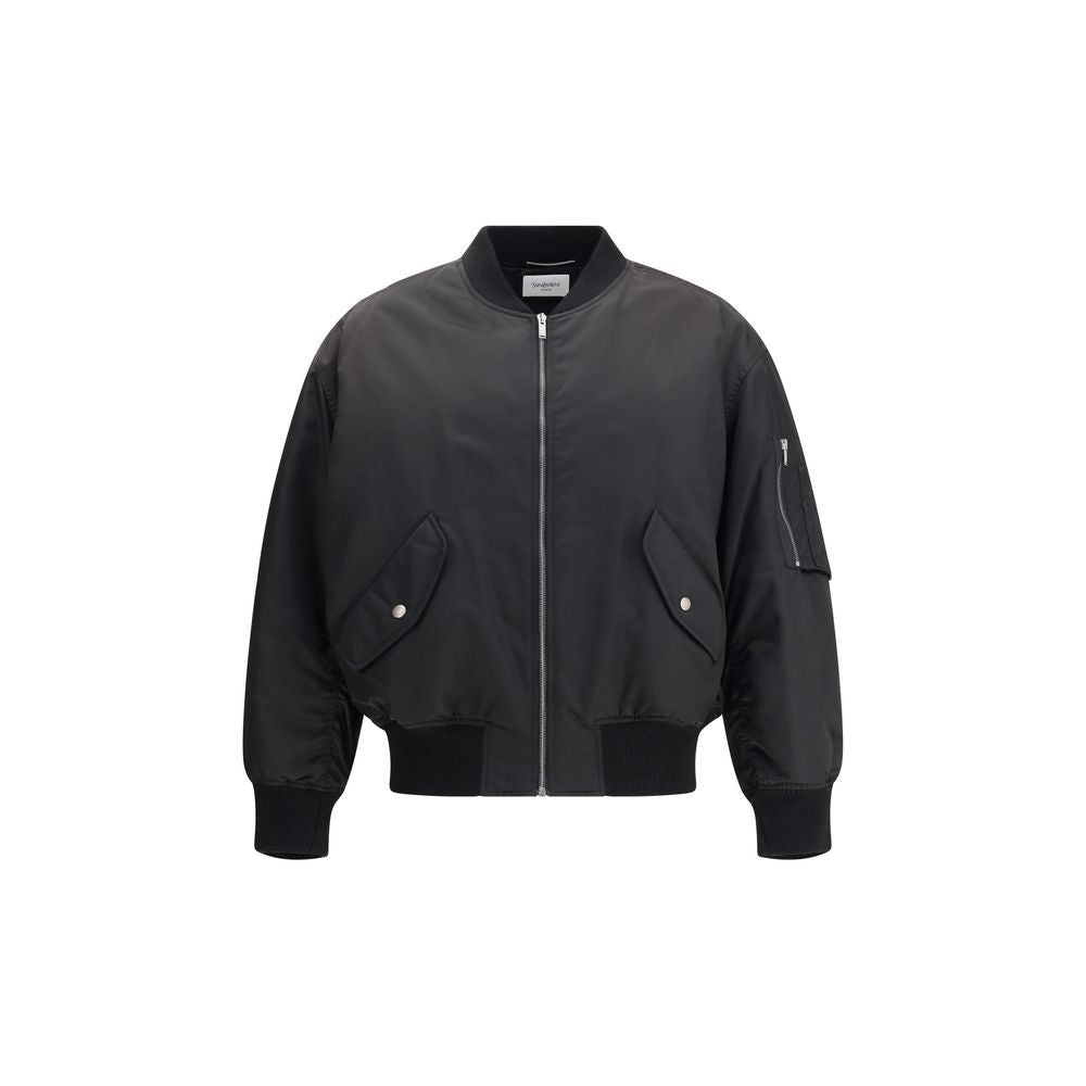 Saint Laurent Black Polyamide Bomber with zipper closure and snap pockets, water-repellent recycled material, oversized fit style.