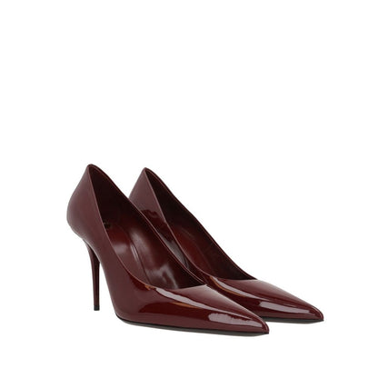 Saint Laurent Red Calfskin Platform Pumps with pointed toe and 9 cm heel, featuring a patent leather finish for a chic look.