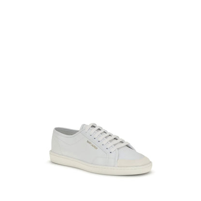 Saint Laurent White Calf Leather Bos Taurus Low Top Sneakers with gold logo and rubber sole.