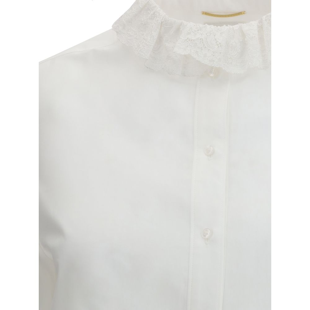 Close-up of Saint Laurent White Cotton Dress Shirt with lace Pierrot collar.