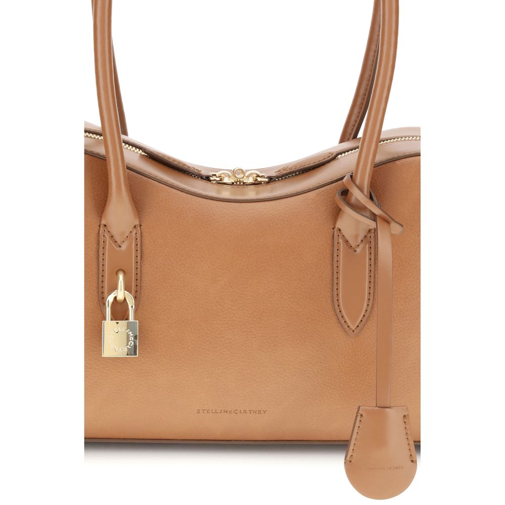 Stella McCartney Beige Nylon Shoulder Bag with logo padlock, embossed logo, and zippered closure, featuring two round handles.