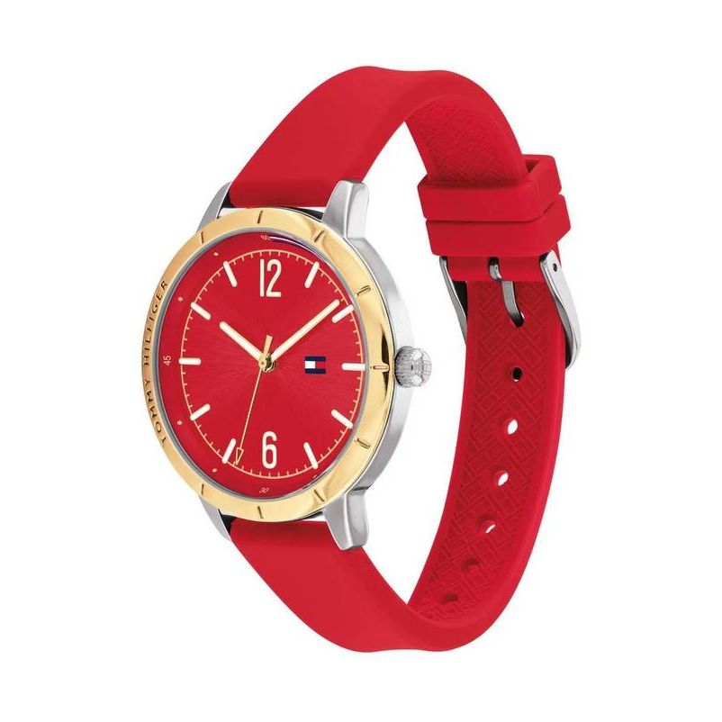TOMMY HILFIGER Mod. 1782561 ladies watch with quartz movement, red dial, gold-tone case, and red bracelet. Water resistant 3 ATM